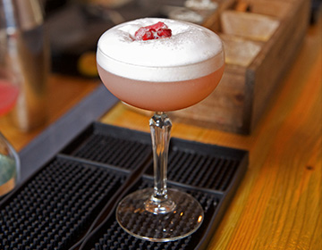 Recipes: Pomegranate Rum Sour & Coconut-Crusted Prawns