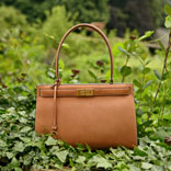 Happy Times: Tory on the Lee Radziwill Satchel
